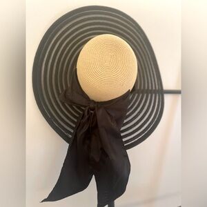Wide brim straw bow tie hat